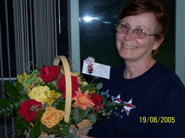 Carol with Anniversary Flowers